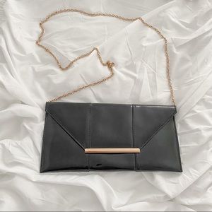 Envelope clutch bag in black & gold
